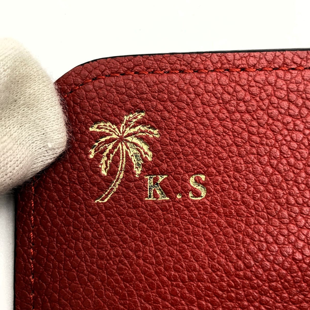 LOUIS VUITTON ルイ・ヴィトン 
 M61836  長財布 
PVC/レザー  レッド
