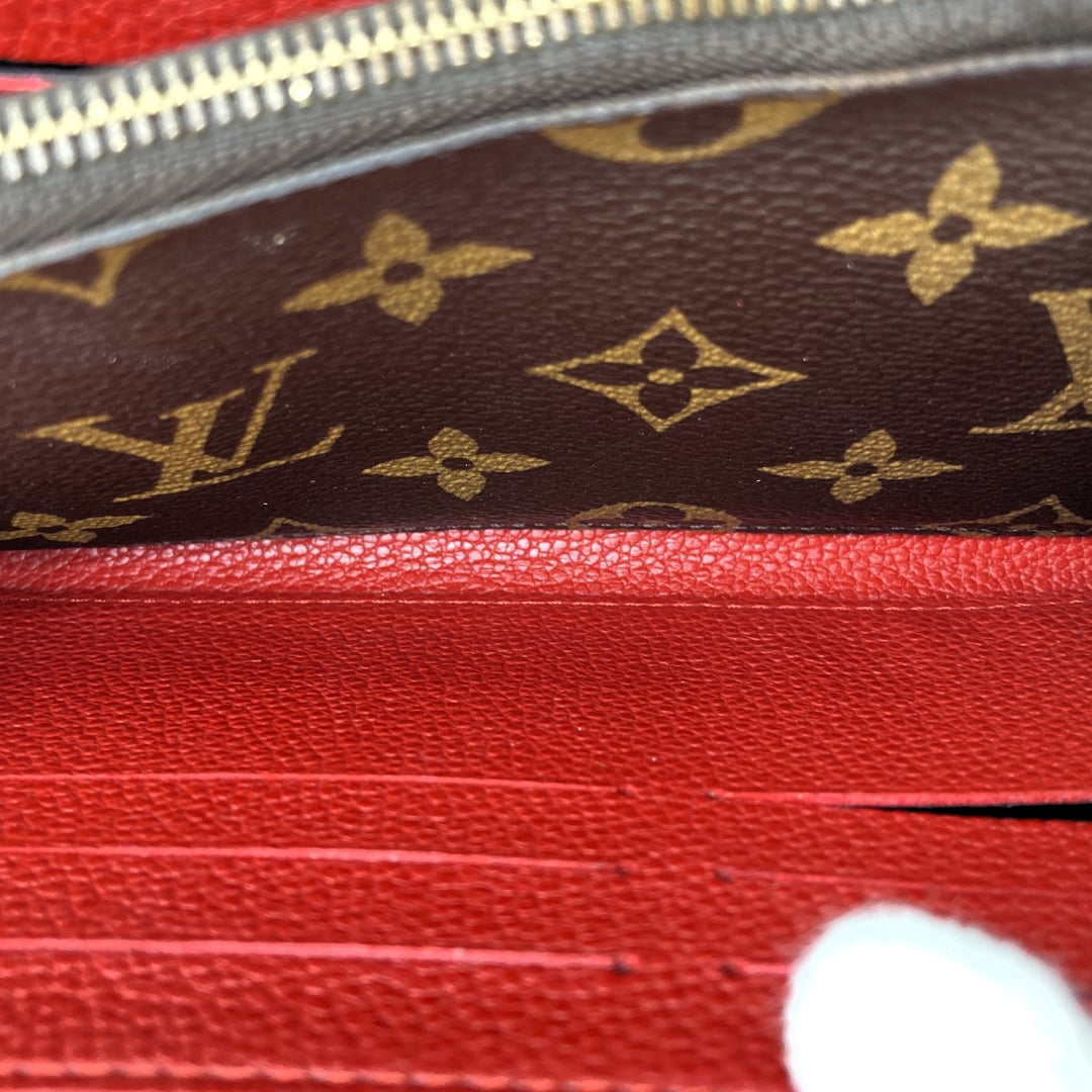 LOUIS VUITTON ルイ・ヴィトン 
 M61836  長財布 
PVC/レザー  レッド