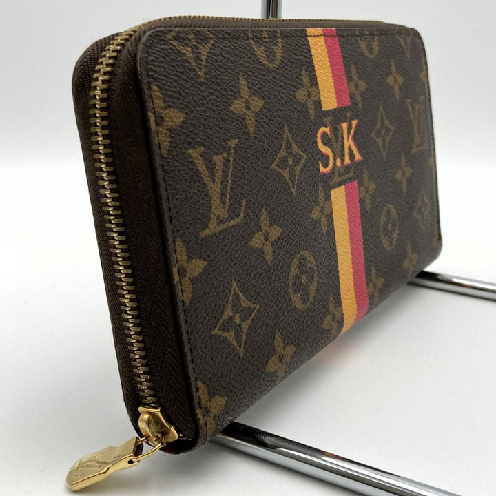 LOUIS VUITTON ルイ・ヴィトン 
 M62581 長財布 
PVC ブラウン