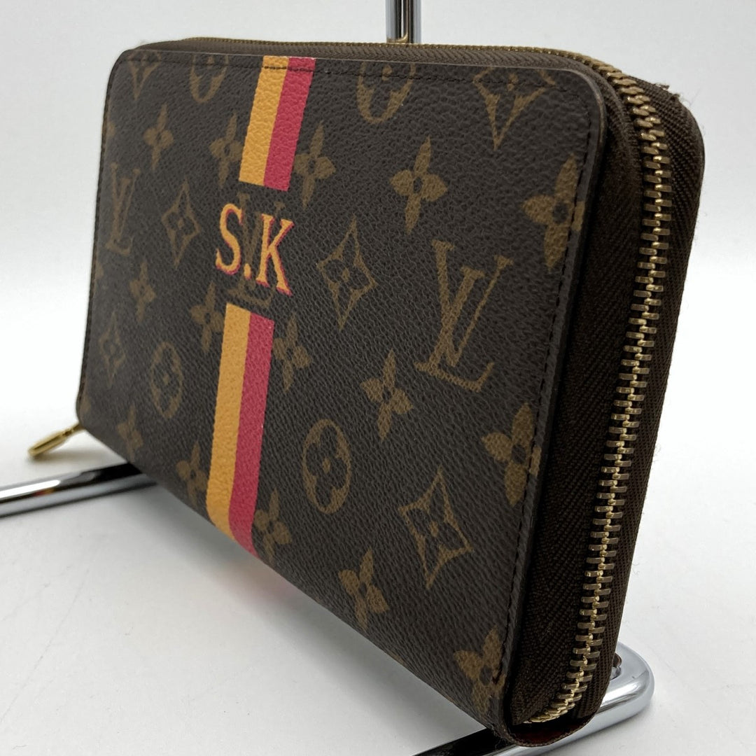 LOUIS VUITTON ルイ・ヴィトン 
 M62581 長財布 
PVC ブラウン
