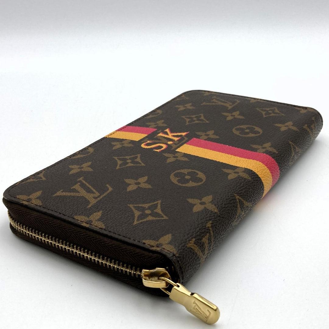 LOUIS VUITTON ルイ・ヴィトン 
 M62581 長財布 
PVC ブラウン