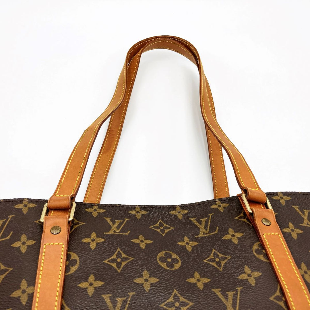 LOUIS VUITTON ルイ・ヴィトン 
 サックショッピング M51110  トートバッグ 
PVC ブラウン