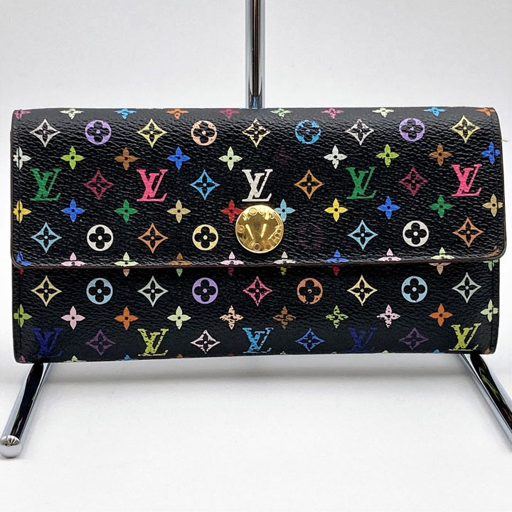 LOUIS VUITTON ルイ・ヴィトン 
 ポルトフォイユ・サラ ヴィオレ M60273 長財布 
PVC ブラック