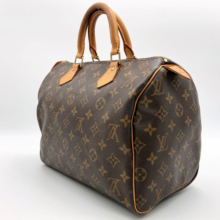 LOUIS VUITTON ルイ・ヴィトン 
 スピーディ30 M41108 ボストンバッグ 
PVC ブラウン