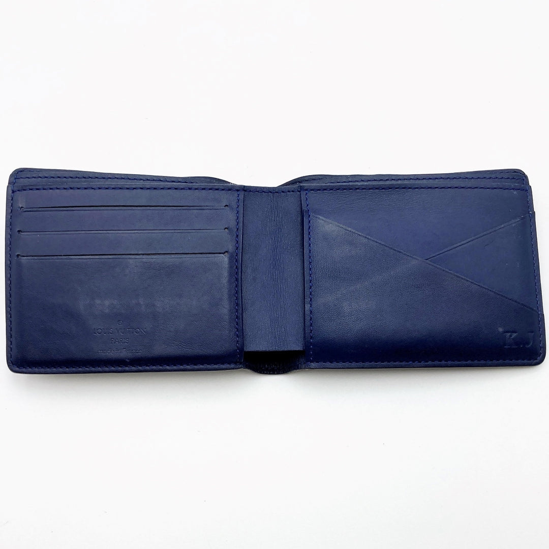 LOUIS VUITTON ルイ・ヴィトン 
 Vシグネチャー ポルトフォイユ ミュルティプル M61169 二つ折り財布 
PVC ブラウン