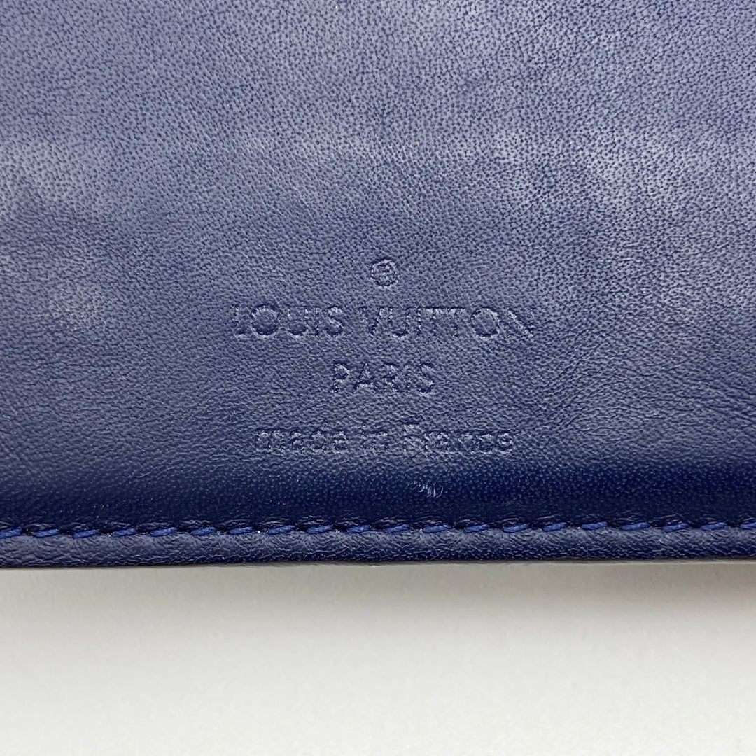 LOUIS VUITTON ルイ・ヴィトン 
 Vシグネチャー ポルトフォイユ ミュルティプル M61169 二つ折り財布 
PVC ブラウン