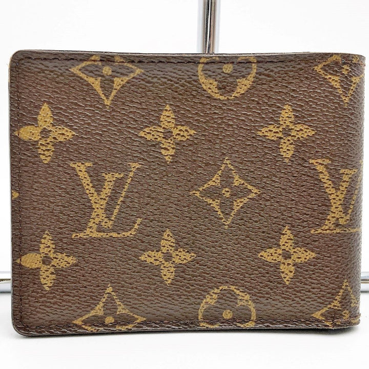 LOUIS VUITTON ルイ・ヴィトン 
 Vシグネチャー ポルトフォイユ ミュルティプル M61169 二つ折り財布 
PVC ブラウン