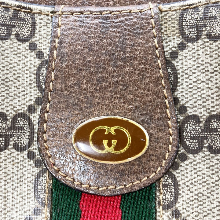 GUCCI グッチ 
 067 クラッチバッグ 
GGスプリームキャンバス ブラウン