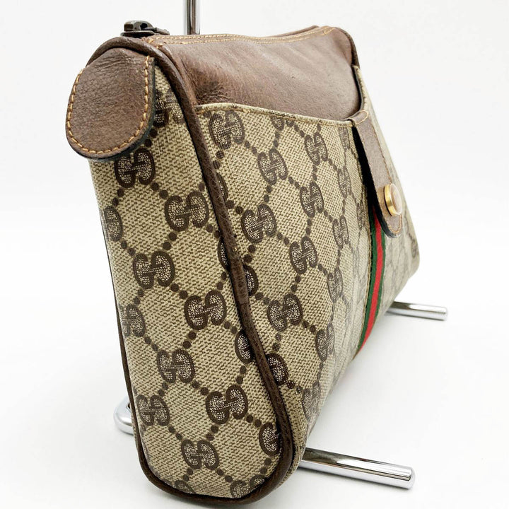 GUCCI グッチ 
 067 クラッチバッグ 
GGスプリームキャンバス ブラウン